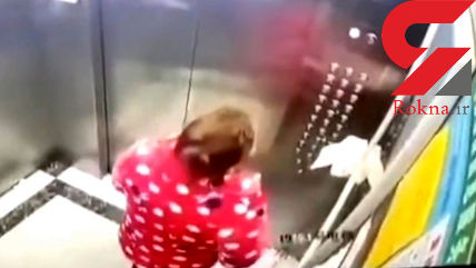 زن چینی در آسانسور